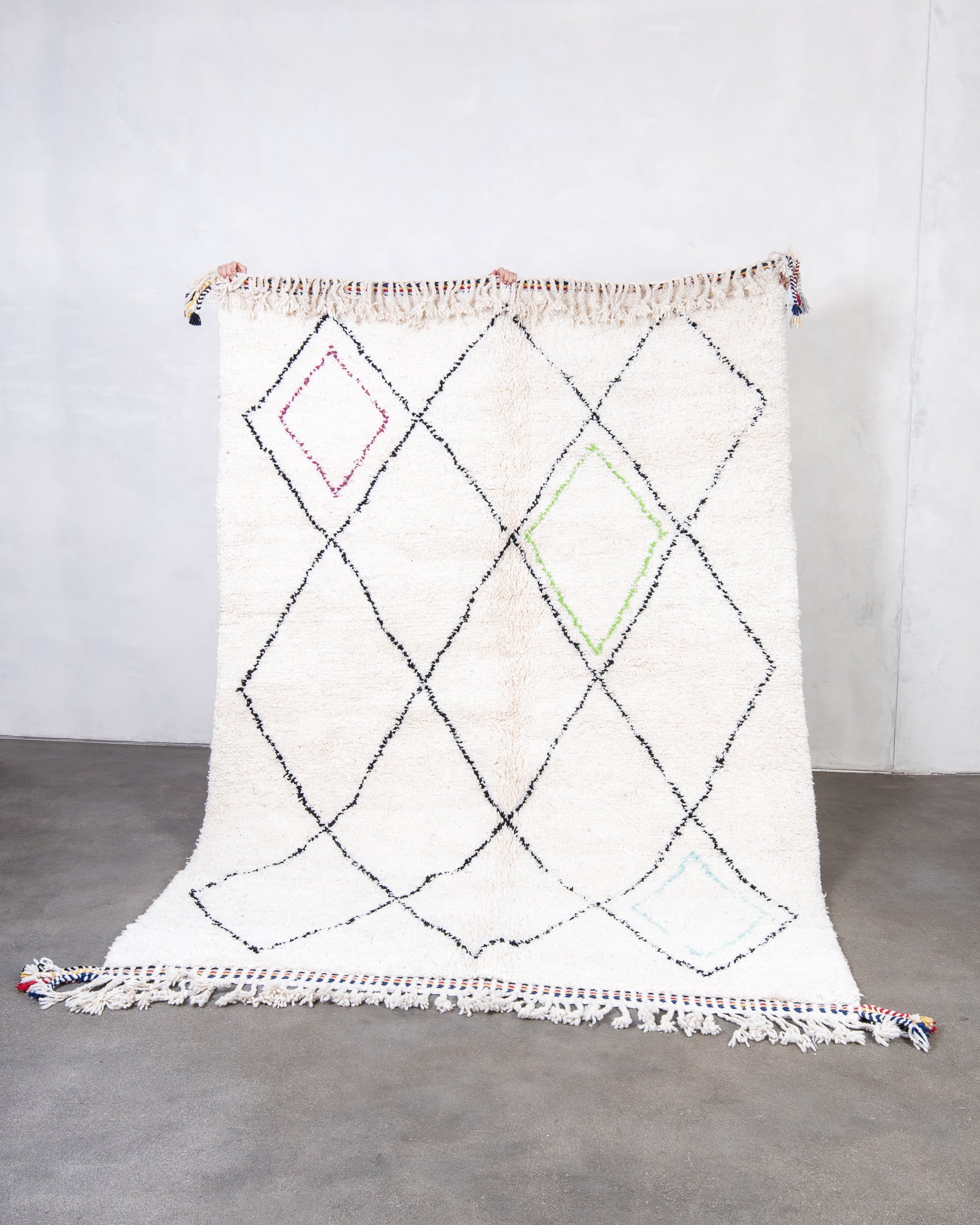 Modern, designer, handcrafted Berber rug from Morocco. Beniourain carpet with beautiful colours and patterns and fluffy wool texture.